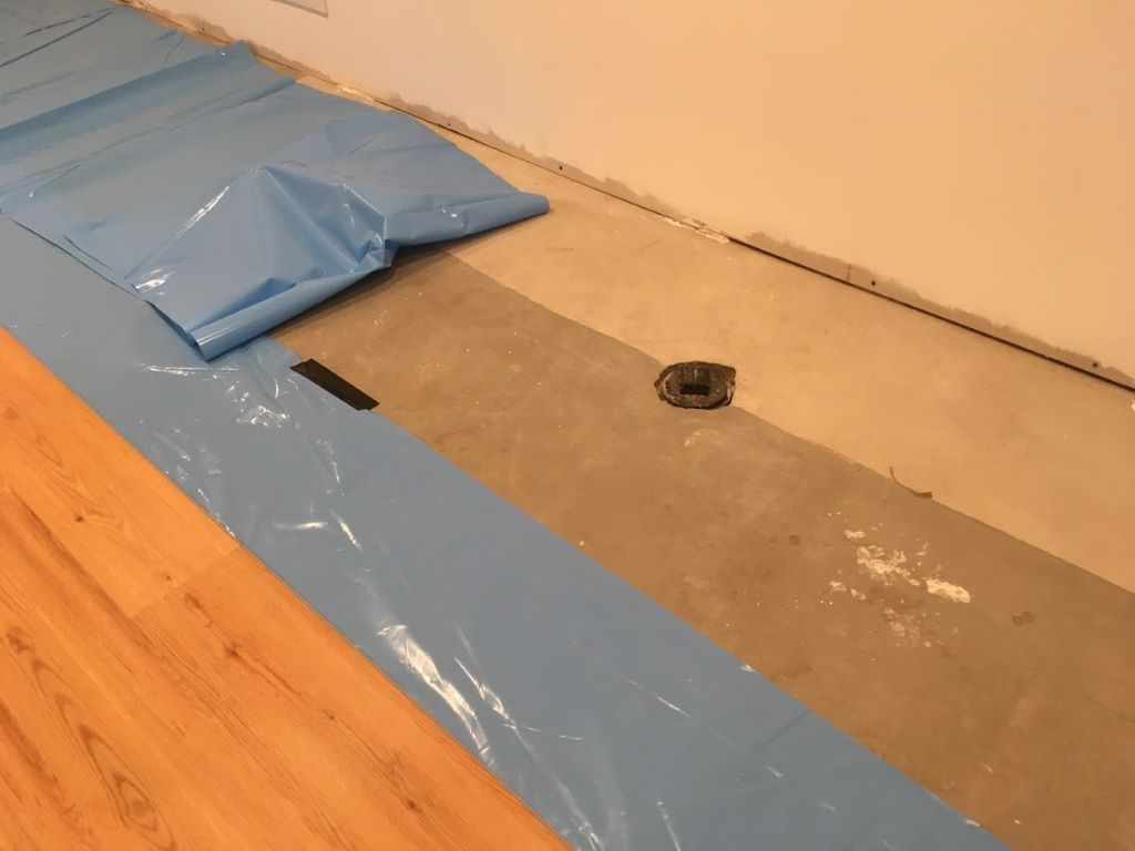 How Do You Cover a Basement Sewer Drain?