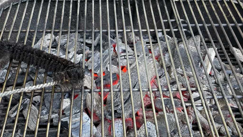 How often should I clean my charcoal grill