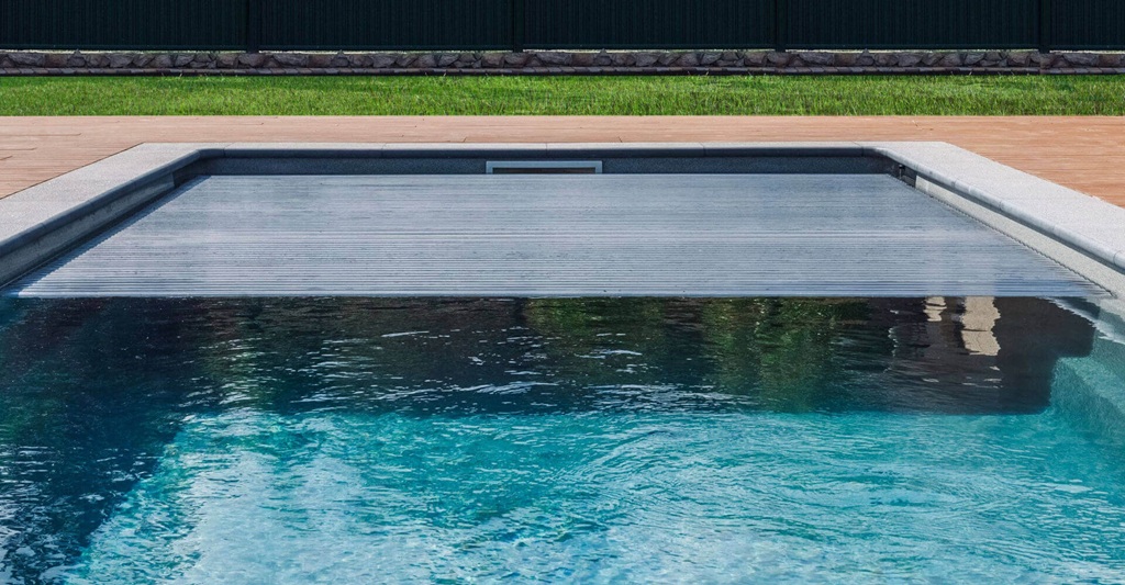 What is the main purpose of a pool cover?