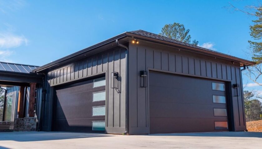 Modern luxury home with a stylish, high-end garage door as a standout architectural feature