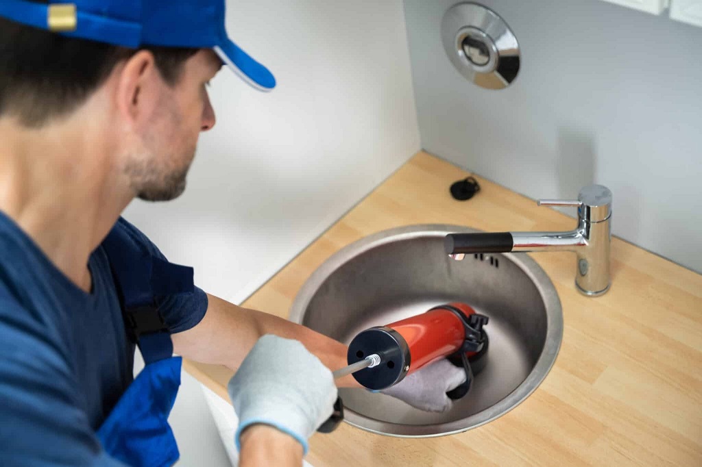 What causes drains to clog more frequently in Dallas homes