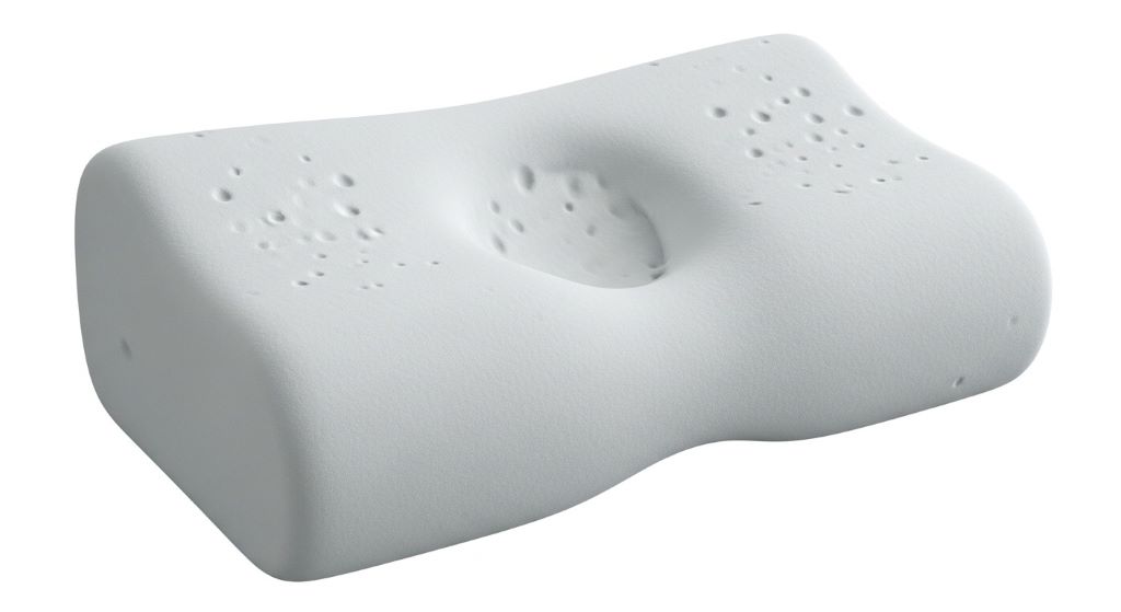 Contoured memory foam pillow with cervical support for back sleepers showing raised edges and center depression