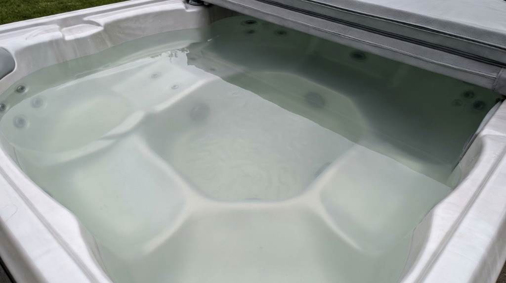 Cloudy hot tub water before treatment